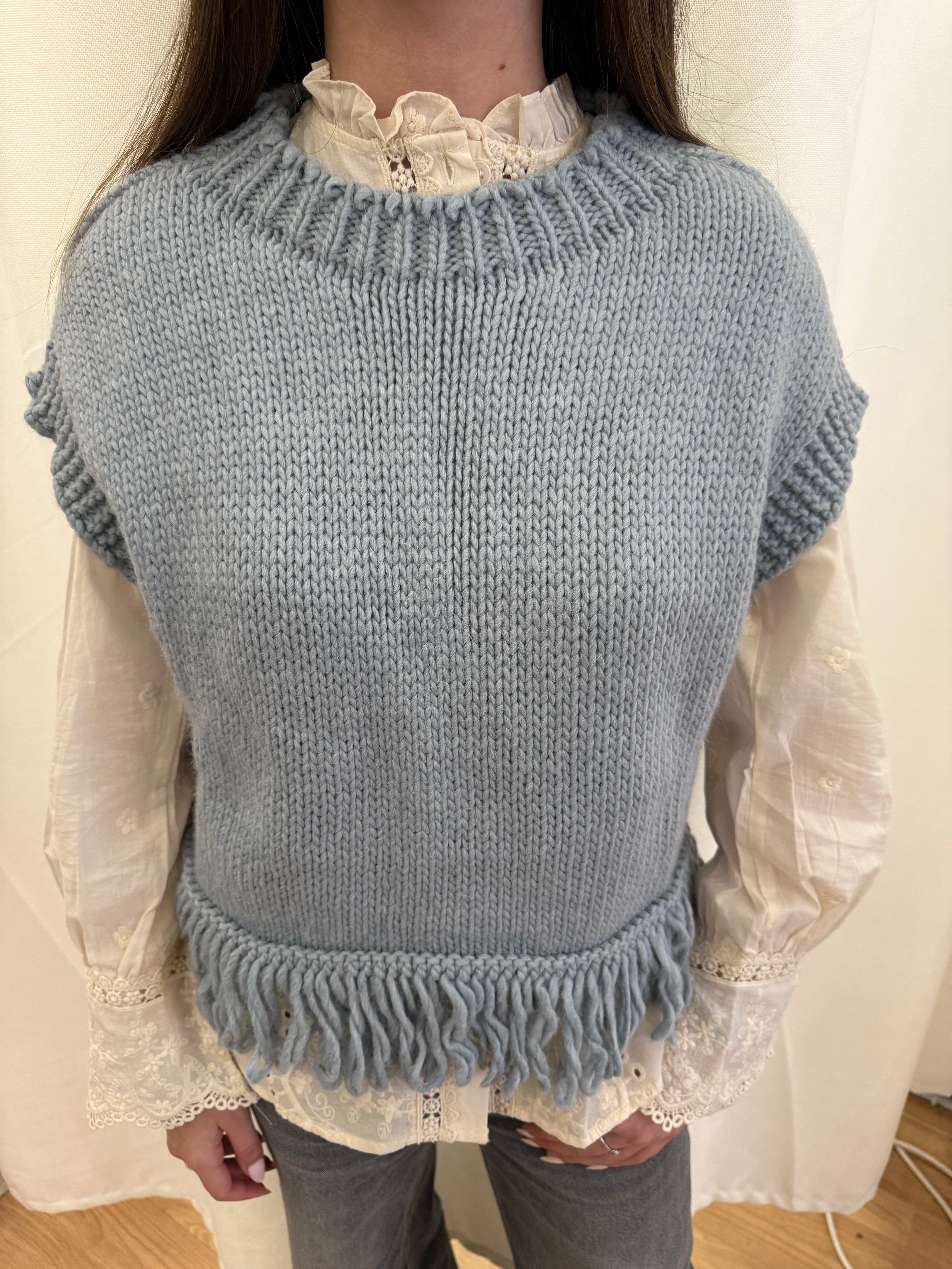 Pull en laine sans manches à franges