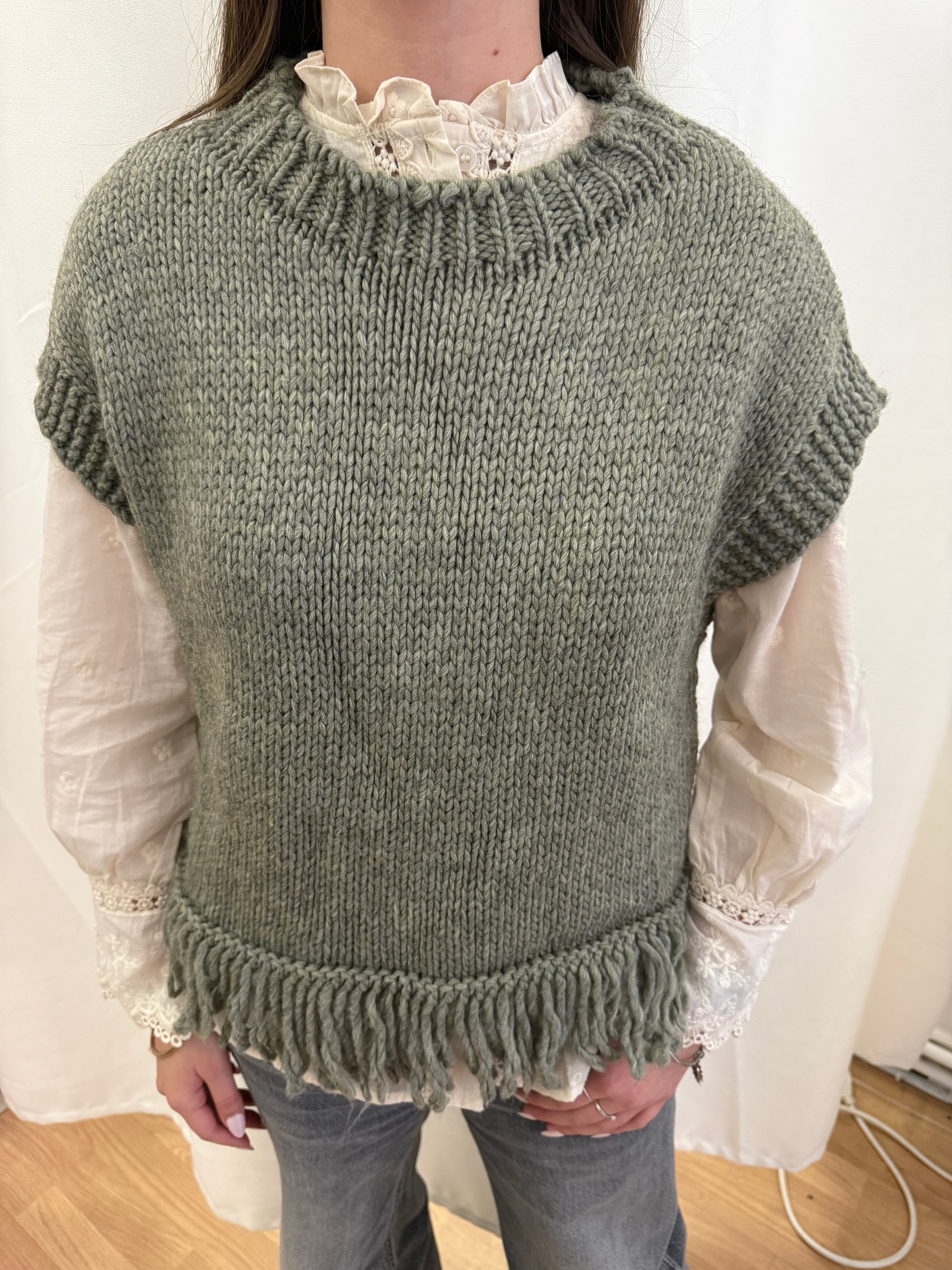 Pull en laine sans manches à franges
