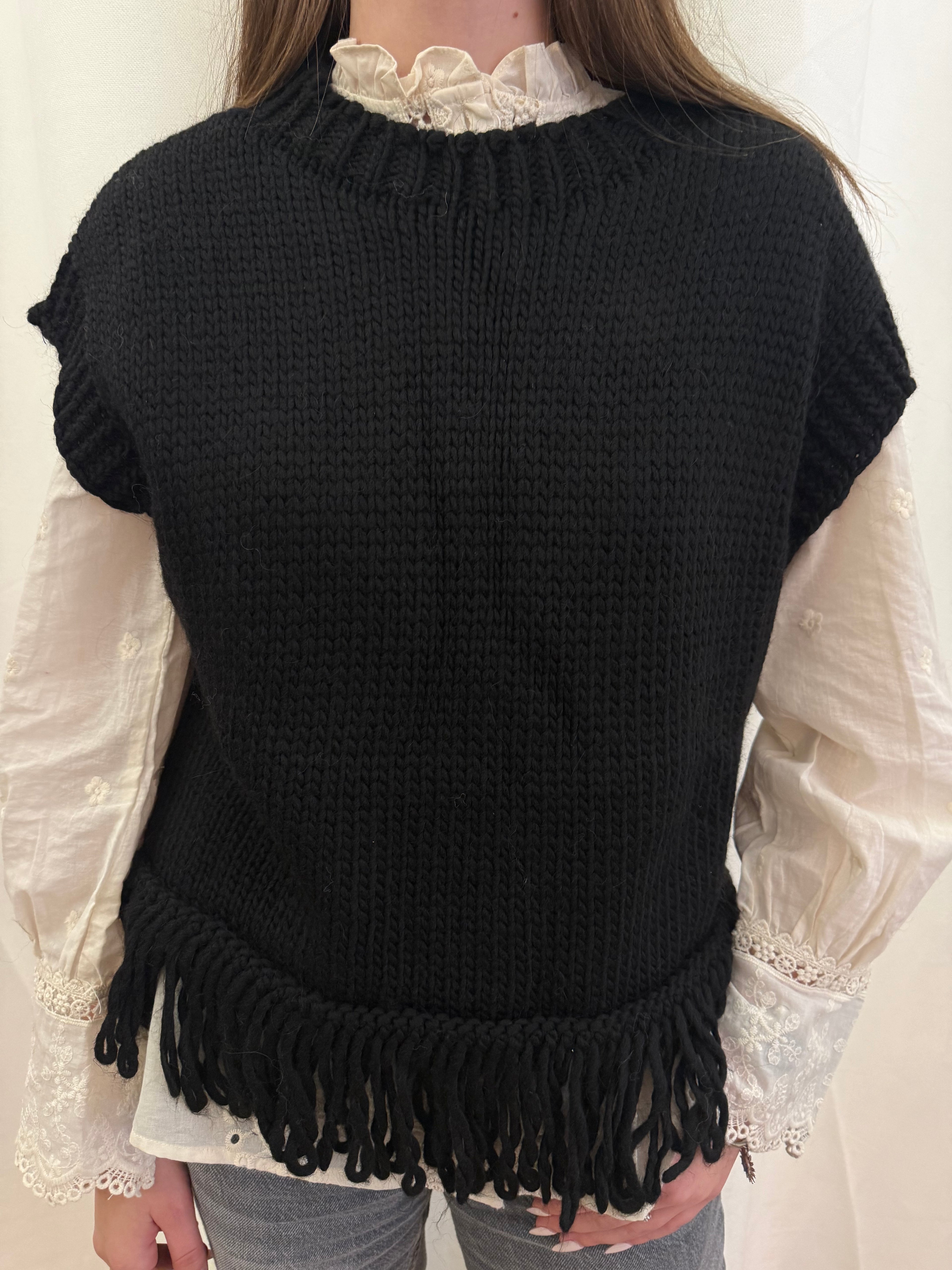 Pull en laine sans manches à franges